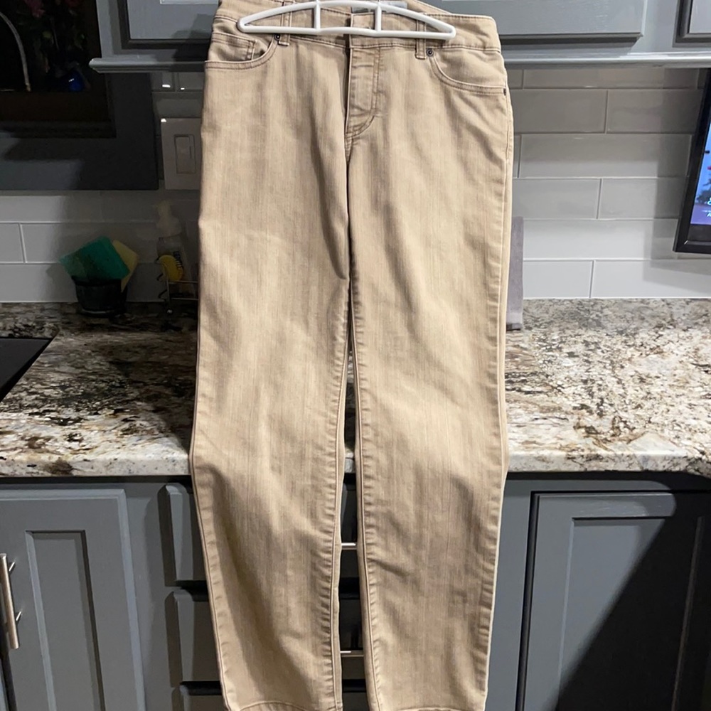 Tan Chico’s platinum jeans